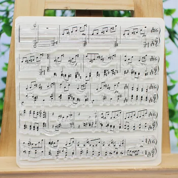 Muzikos mygtukas, gėlių fone skaidrus aišku, antspaudas užrašų knygelė popieriaus modelis antspaudas 